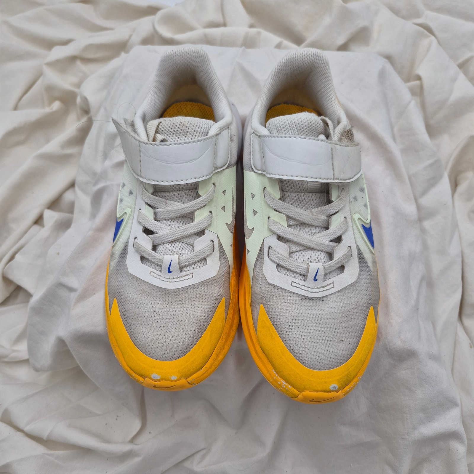 Nike Sonic Fly Kids' Running Shoes White, Yellow, And Hyper Royal Kids Size 1y